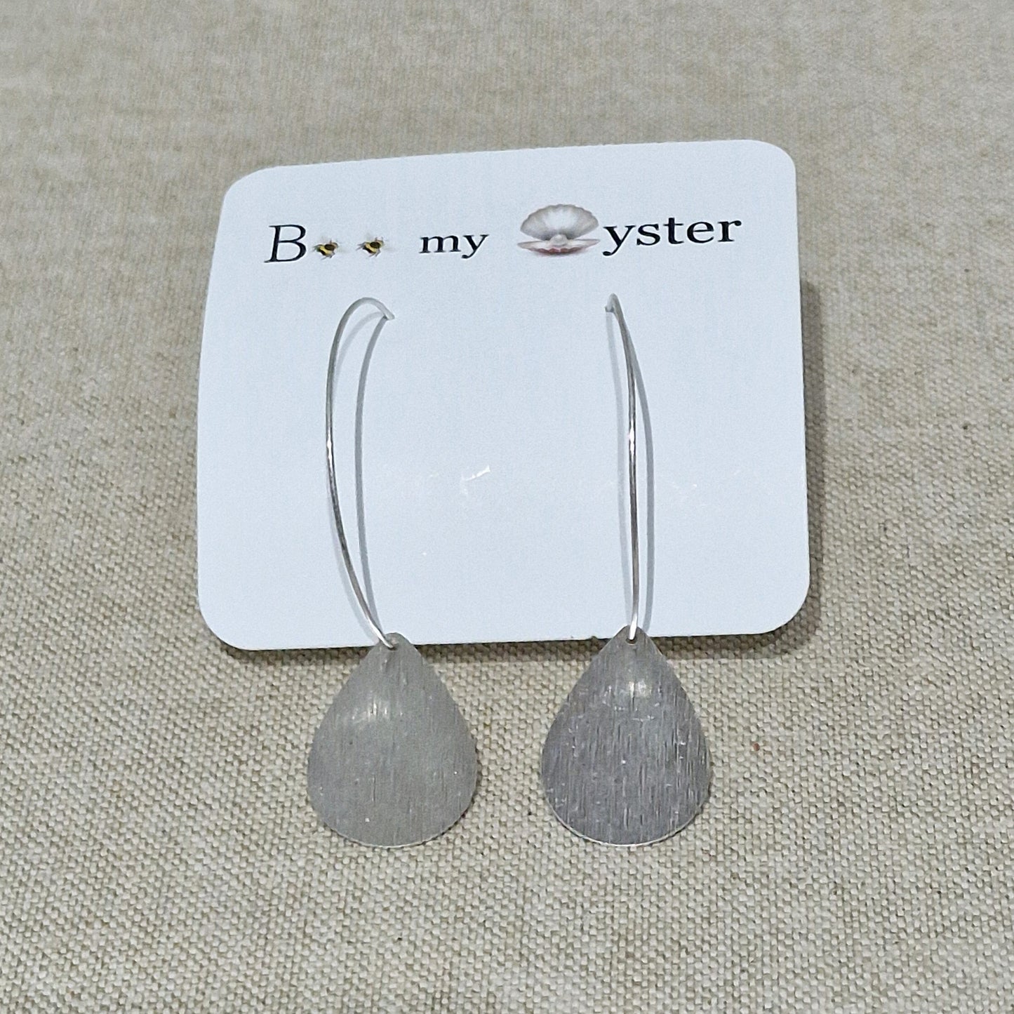 Silver Coloured Teardrop Pierced Fashion Hoop Earrings