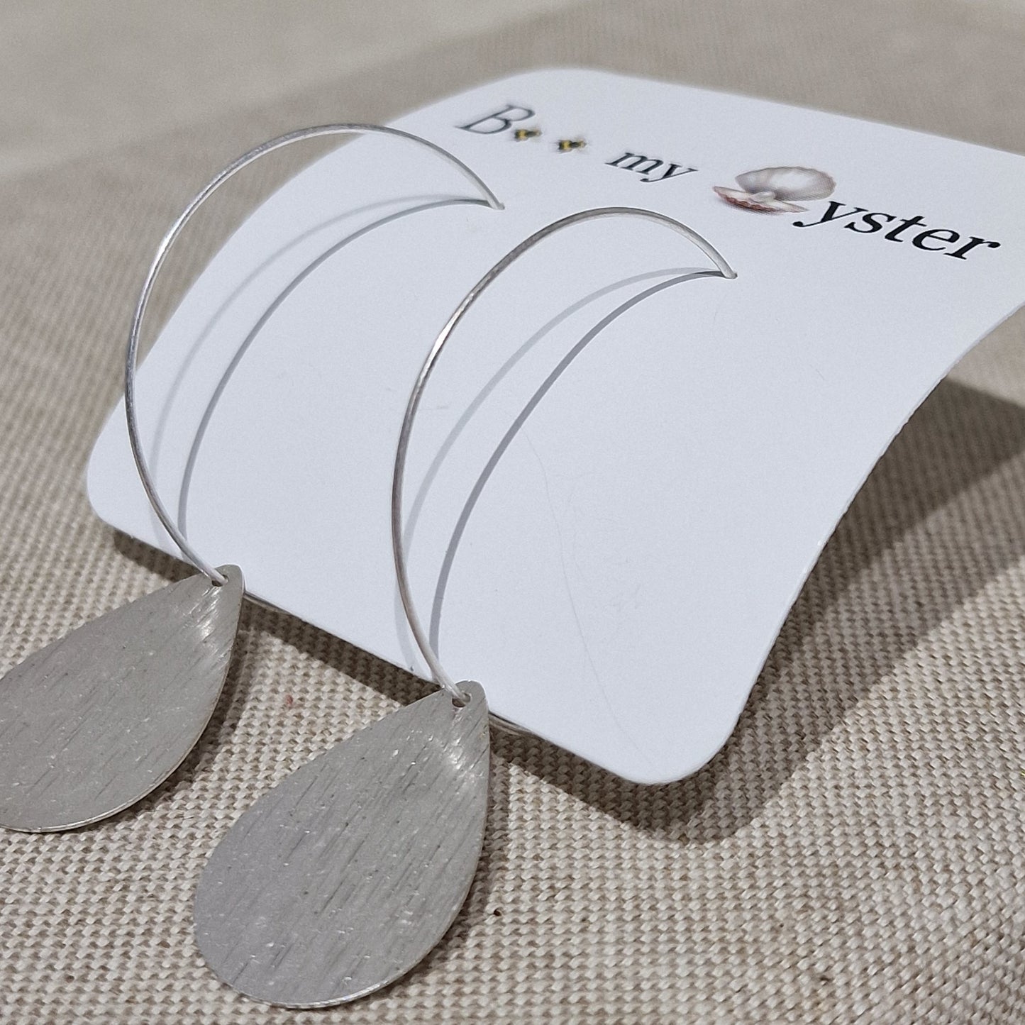 Silver Coloured Teardrop Pierced Fashion Hoop Earrings