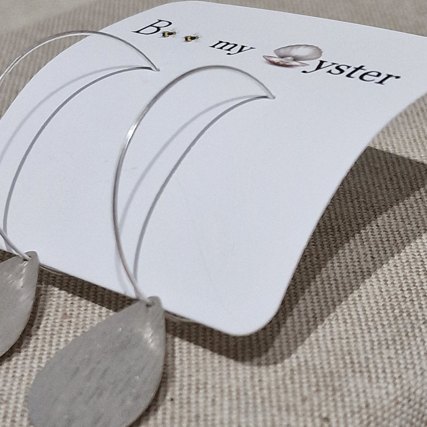 Silver Coloured Teardrop Pierced Fashion Hoop Earrings