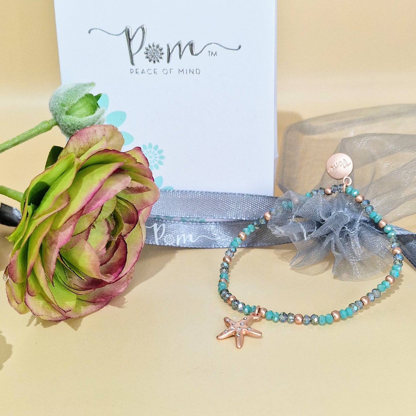 Turquoise Bead with Starfish Charm Rose Gold Stretch Bracelet