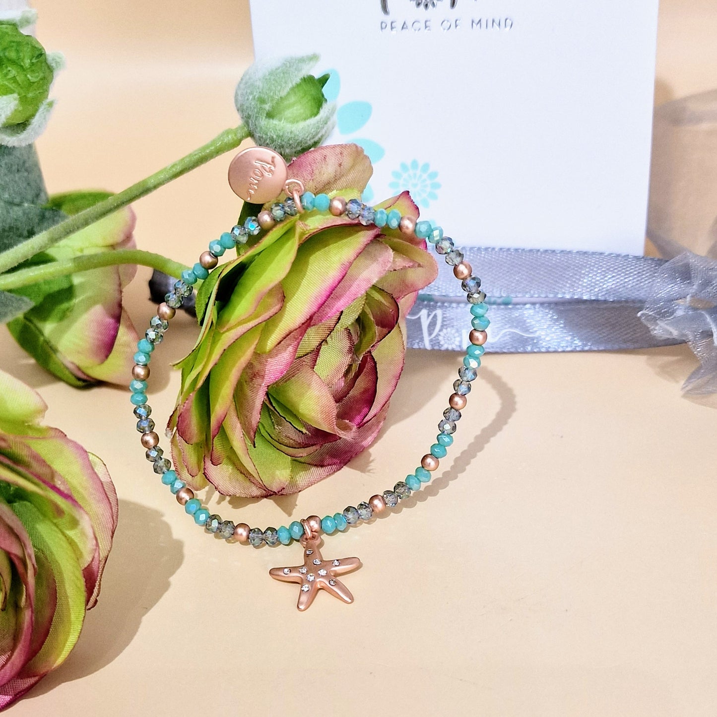 Turquoise Bead with Starfish Charm Rose Gold Stretch Bracelet