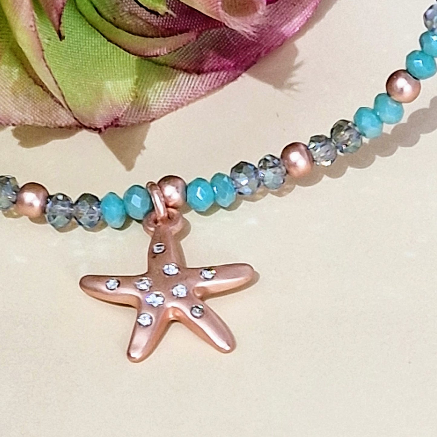 Turquoise Bead with Starfish Charm Rose Gold Stretch Bracelet