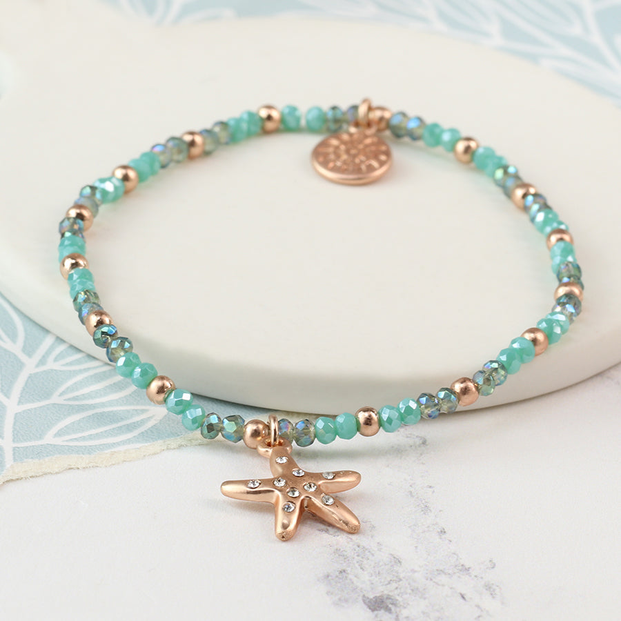 Turquoise Bead with Starfish Charm Rose Gold Stretch Bracelet
