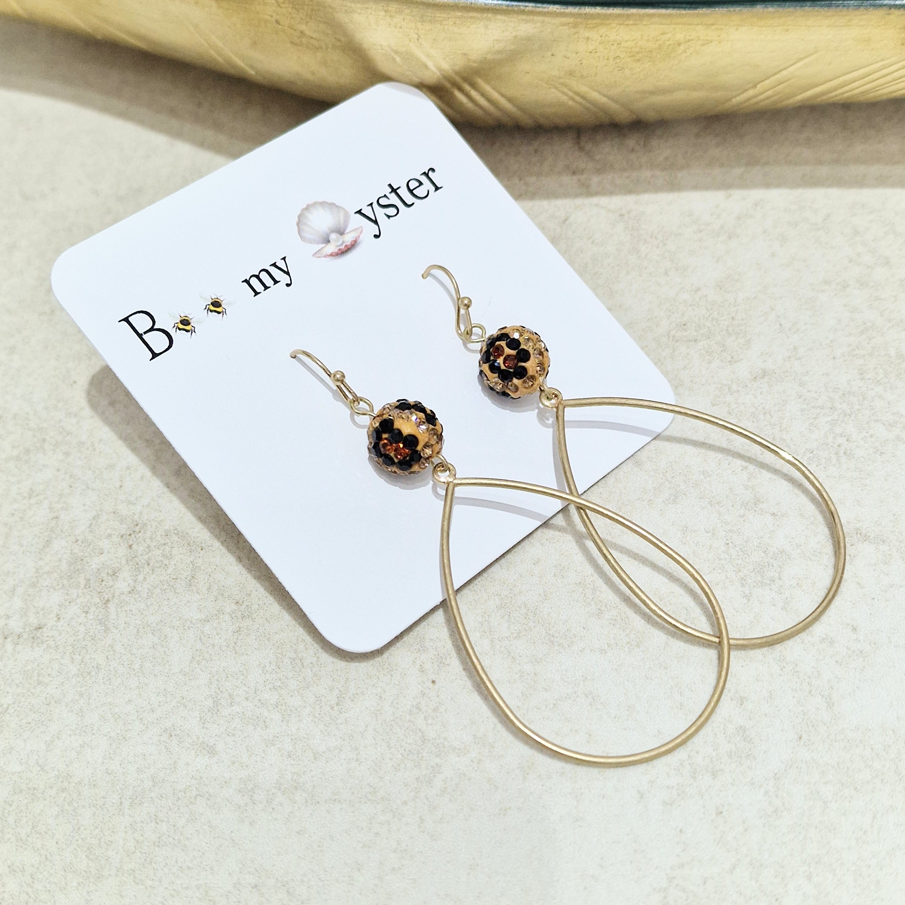 Gold hoop earrings on sale with crystal balls